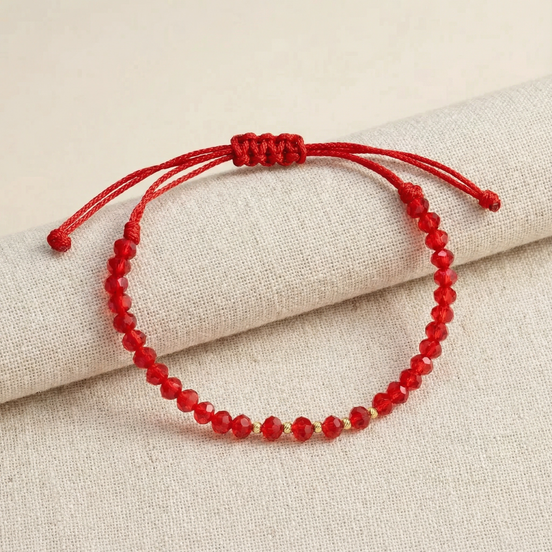 Brățară Reglabilă cu 5 Bile de Aur și Cristale Roșii