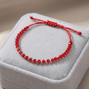 Brățară Aur 14K cu Șnur, 10 Bile Aur și Cristale Roșii – Bijuterie Reglabilă Talisman