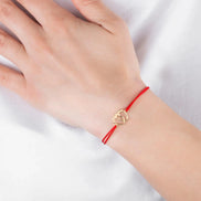 Brățară Aur 14K cu Șnur și Pandantiv Bebeluș – Cadou Botez