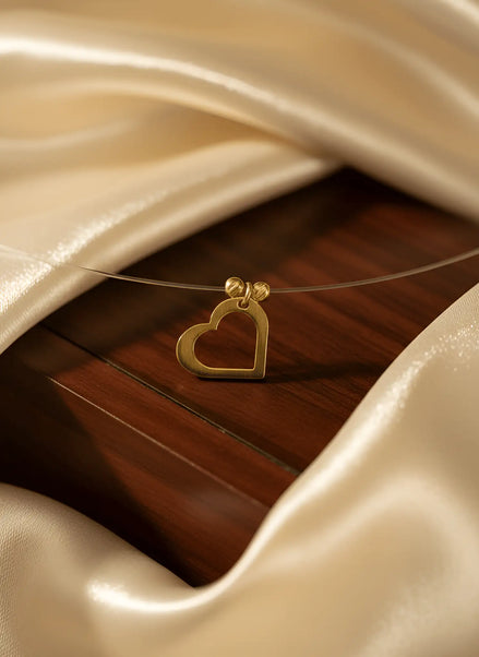 Colier Aur 14K Inimă pe Fir Transparent – Model Floating