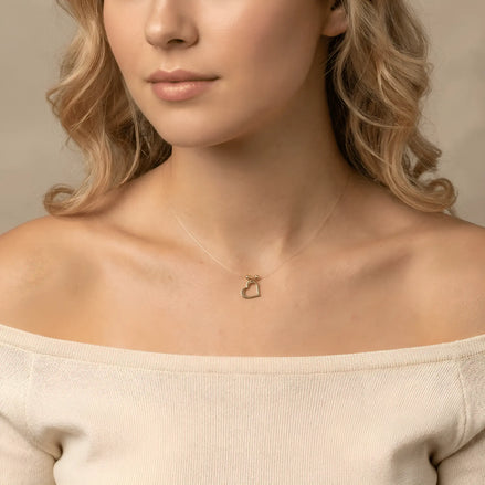 Colier Aur 14K Inimă pe Fir Transparent – Model Floating