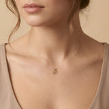 Colier Aur 14K cu Trifoi cu Patru Foi pe Fir Transparent – Model Floating