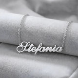 Lănțișor argint 925 rodiat cu pandantiv decupat numele Ștefania în caligrafie scriptură elegantă, 45x10 mm, vedere principală pe pernă albă